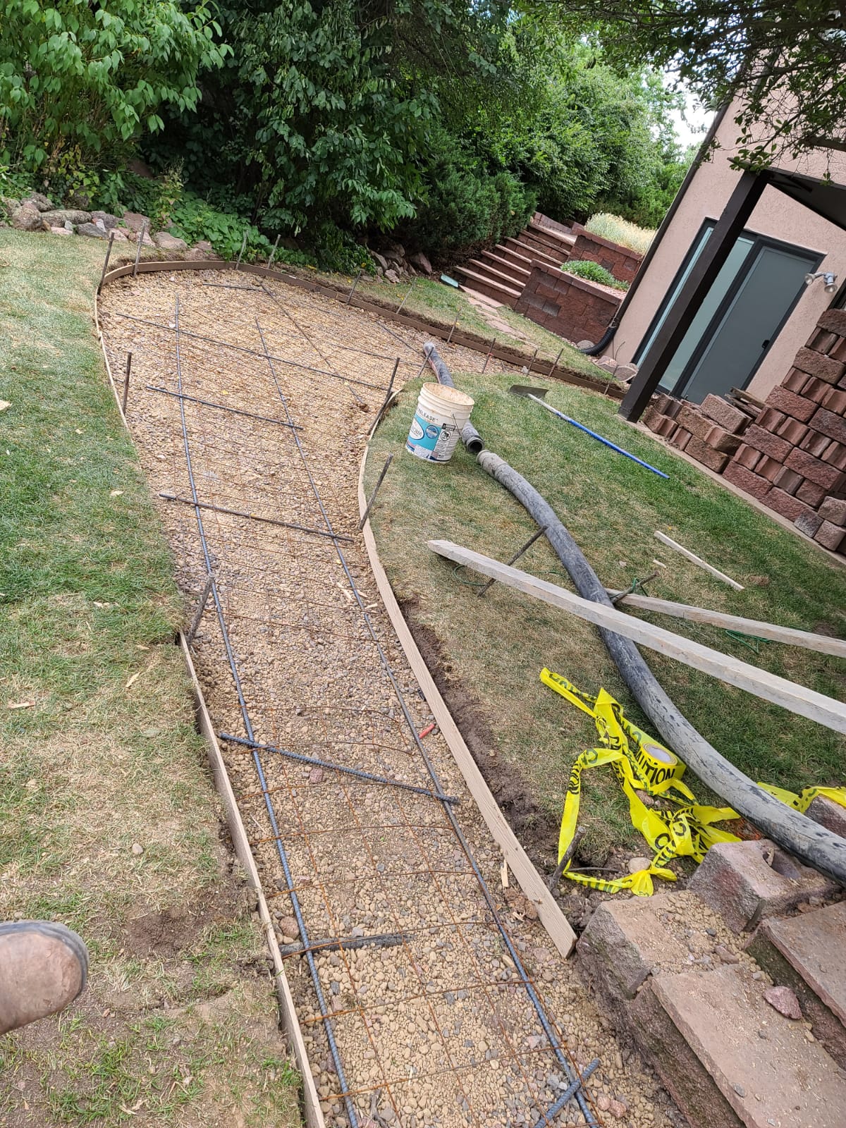 Concrete pathway preparation with rebar